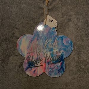 Acrylic pour on wooded flower